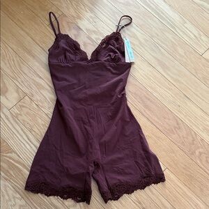 SKIMS Deep Wine Lace onesie